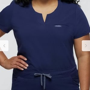 Jaanuu Women's Navy 1 Pocket Tuck In Top